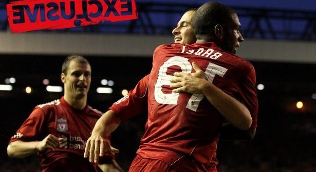 Ryan Babel of Liverpool celebrates with team mates Joe Cole, and Milan Jovanovic after he scores the first goal of the game during the UEFA Europa League play-off first leg match beteween Liverpool and Trabzonspor at Anfield