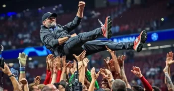 Jurgen Klopp is throw into the air by his players after winning the UEFA Champions League Final