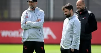 Jurgen Klopp manager of Liverpool Vitor Matos elite development coach of Liverpool and Barry Lewtas Liverpool Under 21's head coach during a training session at AXA Training Centre