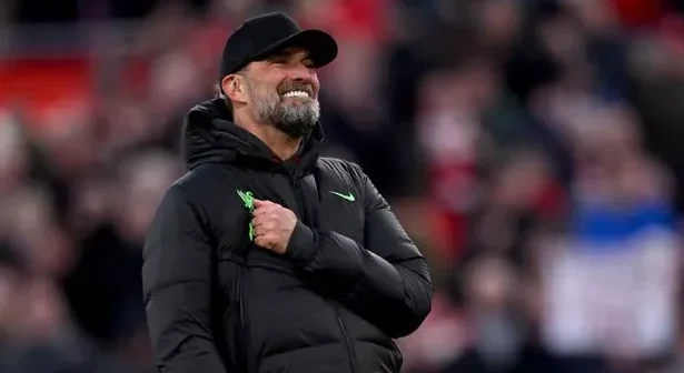 Jurgen Klopp manager of Liverpool showing his appreciation to the fans at the end of the Premier League match between Liverpool FC and Burnley FC at Anfield