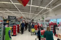 Shoppers queuing for the tills at Asda